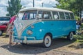 Classic vintage white and blue VW Transporter camper parked Royalty Free Stock Photo