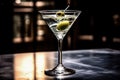 a classic Vodka Martini Gin cocktail served in a unique glass, garnished with plump olives. Royalty Free Stock Photo