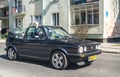 Classic Volkswagen Golf 1 convertible at a veteran cars meeting