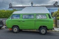 Classic VW campervan in green color