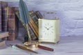 Classic watch with a magnifying glass and an antique writing pen
