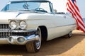 Classic white Cadillac at the beach Royalty Free Stock Photo