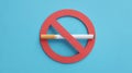 No Smoking Sign with Cigarette on Blue Background Royalty Free Stock Photo