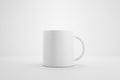 Classic white mug and front view on white background with blank template mockup style. Empty cup or drink mug. 3D rendering Royalty Free Stock Photo