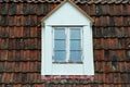 Classic, white window frame on the side of a weathered old brick wall Royalty Free Stock Photo