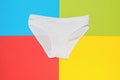 Classic white women`s panties on a colored background of four colors. Minimal concept of women`s underwear Royalty Free Stock Photo