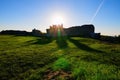 Classic wide-angle landscape view of ruins of an ancient Krements castle. Part of the defensive wall during sunset Royalty Free Stock Photo