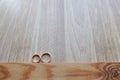 Classic wide wedding rings lie on a wooden surface. Wedding rings and template for text. Close-up