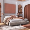Classic wooden bedroom with master bed, parquet floor, niches and carpet in white and orange tones. Arched door with curtains and Royalty Free Stock Photo