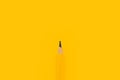 Classic yellow carpenter handyman pencil on same color background