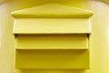 Classic yellow mail box detail. Postbox. Postal service. Communication