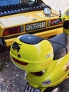 Classic Yellow Piaggio Scooter and Fiat X19
