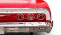 Classical American Vintage car Chevrolet Impala 1964. Detail of back lights car view. White background Royalty Free Stock Photo