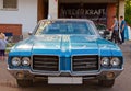 Classical American vintage car Oldsmobile Cutlass 1969. Front view Royalty Free Stock Photo