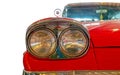 Classical American Vintage car 1958. White background. Front lights detail Royalty Free Stock Photo