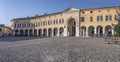 Classical arcade on cobbled square in historical town, Rovato, Italy Royalty Free Stock Photo