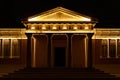 Classical architecture building with columns illuminated at night Royalty Free Stock Photo