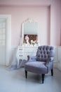 Classical armchair and mirror table at living room interior Royalty Free Stock Photo