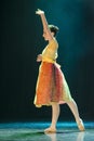 Classical ballerina dancing on stage