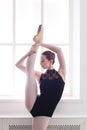 Classical Ballet dancer in split stretching, portrait Royalty Free Stock Photo