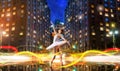 Classical ballet dancer dancing on city road Royalty Free Stock Photo