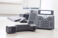 Classical black telephone in the office, customer support and telesale