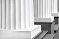 Classical black and white Greek columns in a row