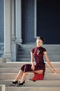 A classical Chinese woman dressed in cheongsam