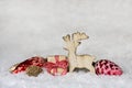 Classical christmas decoration with snow and wooden moose with r Royalty Free Stock Photo