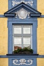 Classical colorful window with pediment in Prague Royalty Free Stock Photo