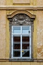 Classical colorful window with pediment in Prague