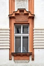 Classical colorful window with pediment in Prague