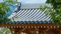 Classical curved gray Roof of gate to Japanese Zen Garden. Royalty Free Stock Photo