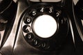 Classical dial of an old bakelite telephone. Isolated on white background Royalty Free Stock Photo