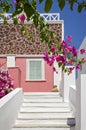 Classical Greek architecture of the streets with white stairs, Santorini Island Royalty Free Stock Photo