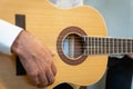 Classical guitar - Guitarist playing acoustic guitar in studio Royalty Free Stock Photo