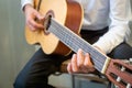 Classical guitar - Guitarist playing acoustic guitar in studio Royalty Free Stock Photo