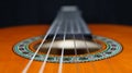 Classical guitar looking over sound hole, down neck Royalty Free Stock Photo