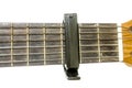 Classical guitar neck with a capo Royalty Free Stock Photo