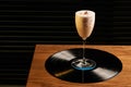 Classical Lucy cocktail on vinyl tray background