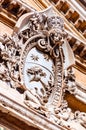 Classical marble emblem hanging on one of the facades of Vatican museums complex buildings in Pine Tree garden Royalty Free Stock Photo