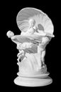 Statuette with antique scene on a black background