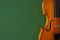 Classical Music Concert Poster With Brown Color Violin On Dark Green Background With Copy Space