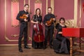 Classical music quartet posing after the concert. Royalty Free Stock Photo