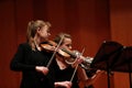 Classical music. Violinists in concert. Stringed, violinist.Closeup of musician playing the violin during a symphony