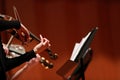 Classical music. Violinists in concert. Stringed, violinist.Closeup of musician playing the violin during a symphony Royalty Free Stock Photo