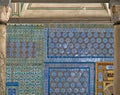 Classical oriental design detail on tiled wall Royalty Free Stock Photo