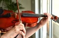 Classical player hands. Details of violin playing