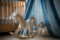 classical rocking horse with ribbons in a nursery Royalty Free Stock Photo