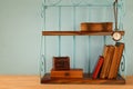 Classical shelf with vintage male objects Royalty Free Stock Photo